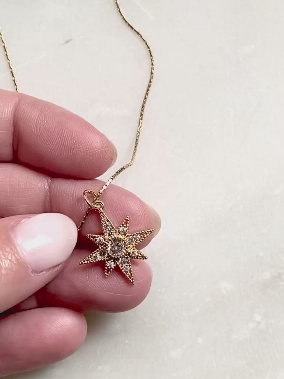Gold north star necklace