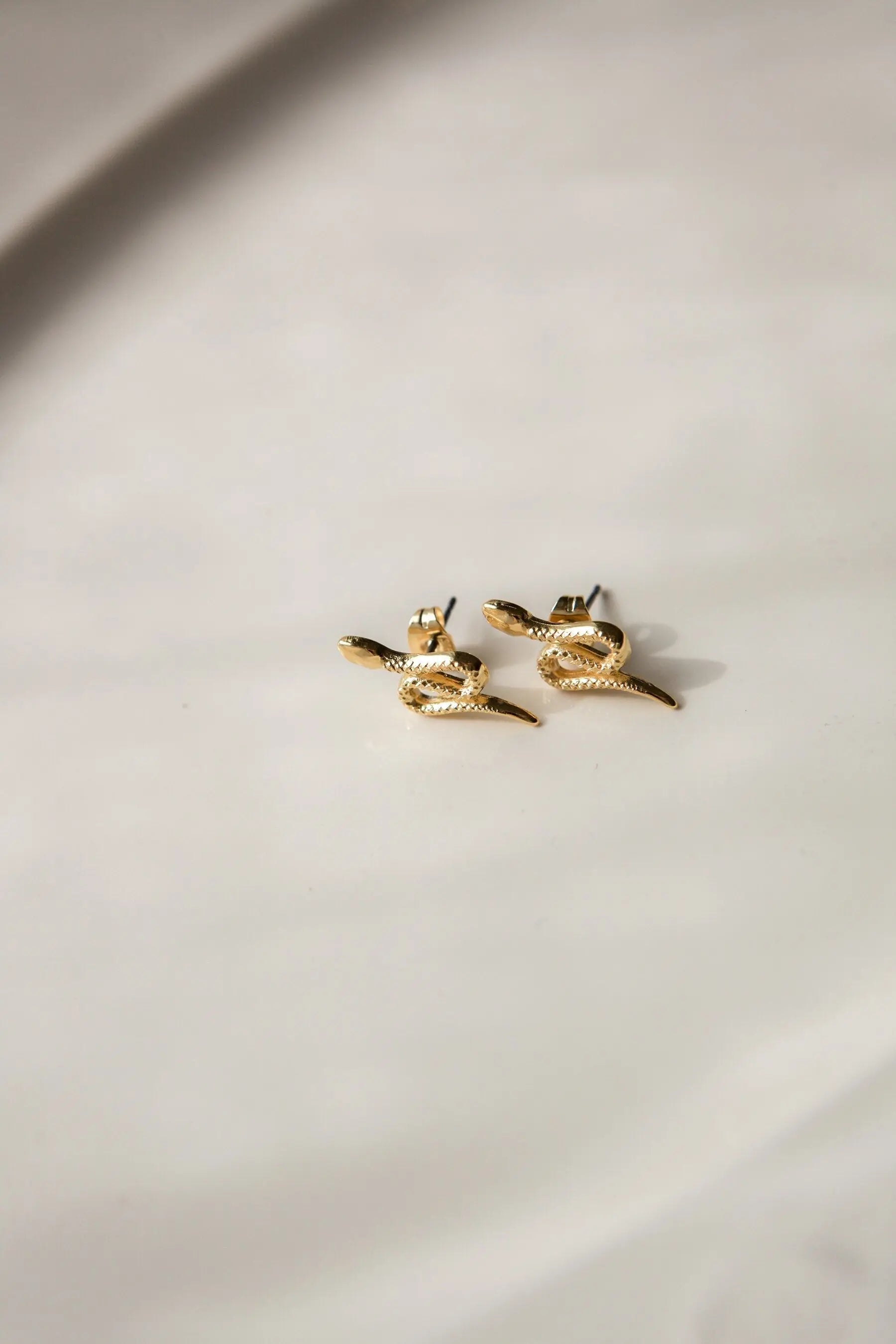 Snake gold earrings