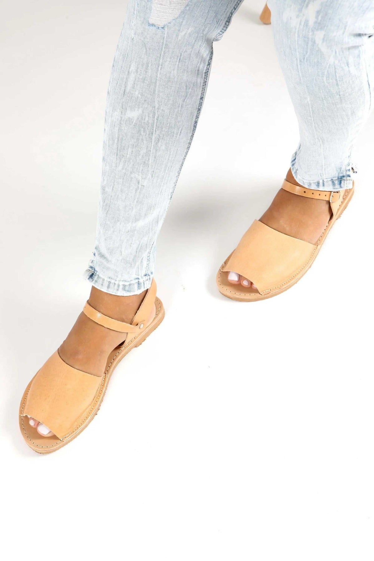 CLEO Handmade Greek Sandals in natural tan leather with flat soles, open toes and slim ankle and instep straps