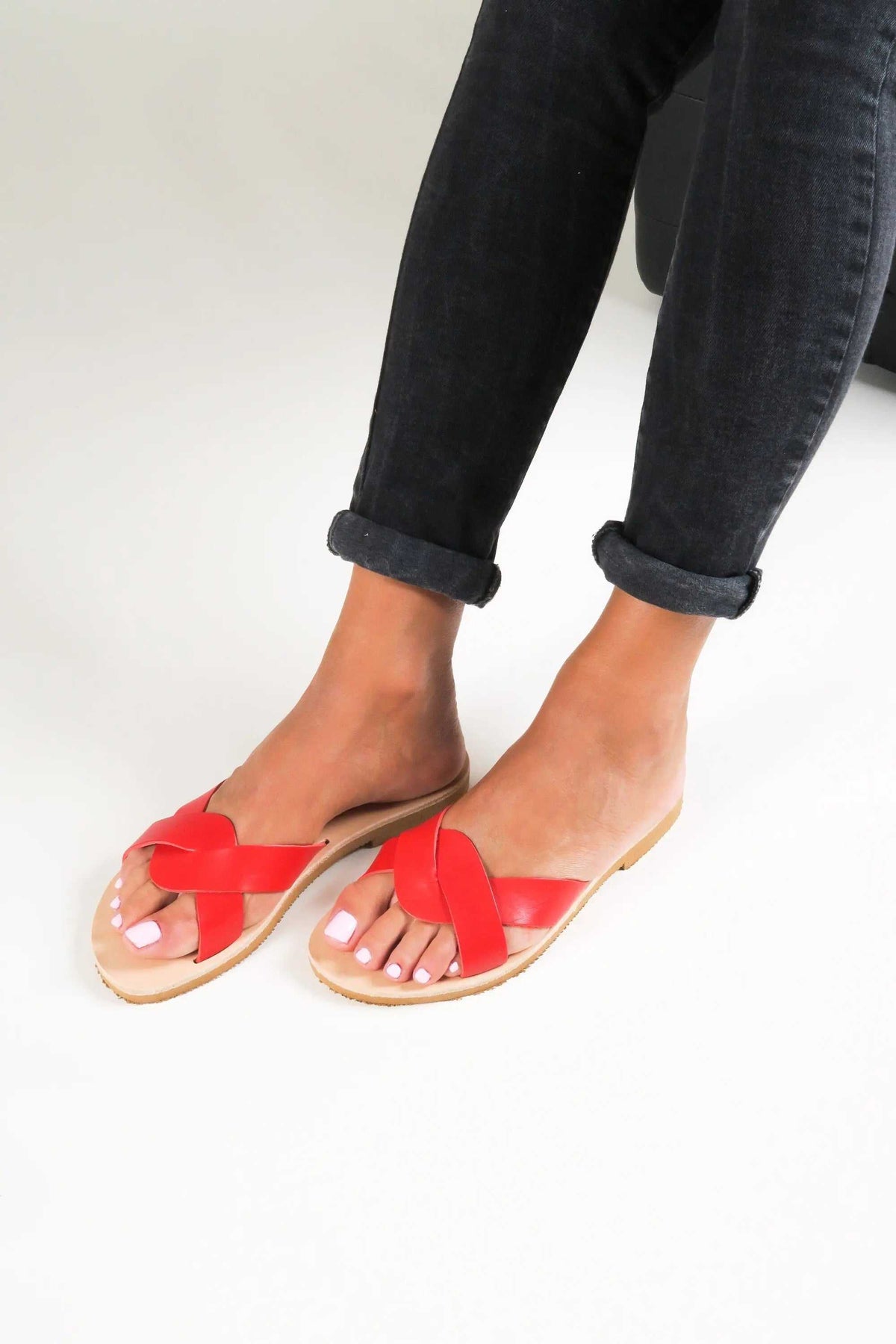 CYNTHIA Handmade Greek Sandals in red leather with crossed toe straps, natural leather insoles and rubber soles