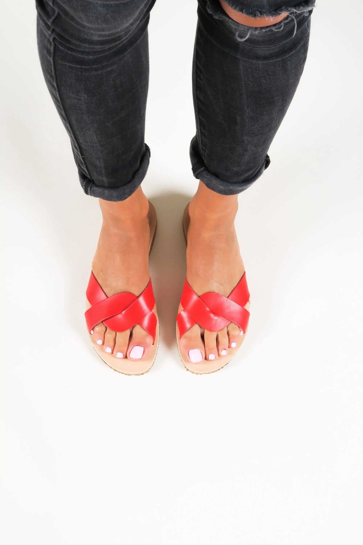 CYNTHIA Handmade Greek Sandals in bright red leather with crossed straps and open-toe design