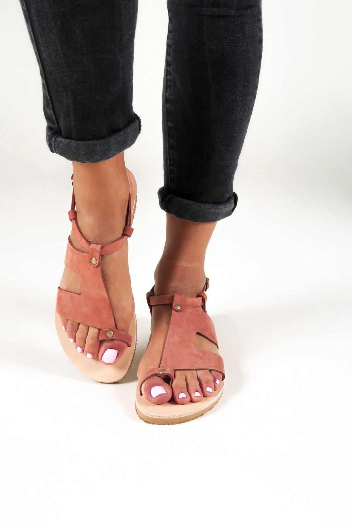 DELOS Handmade Greek Sandals in brick-red suede leather, featuring ankle straps, toe loops and natural leather soles