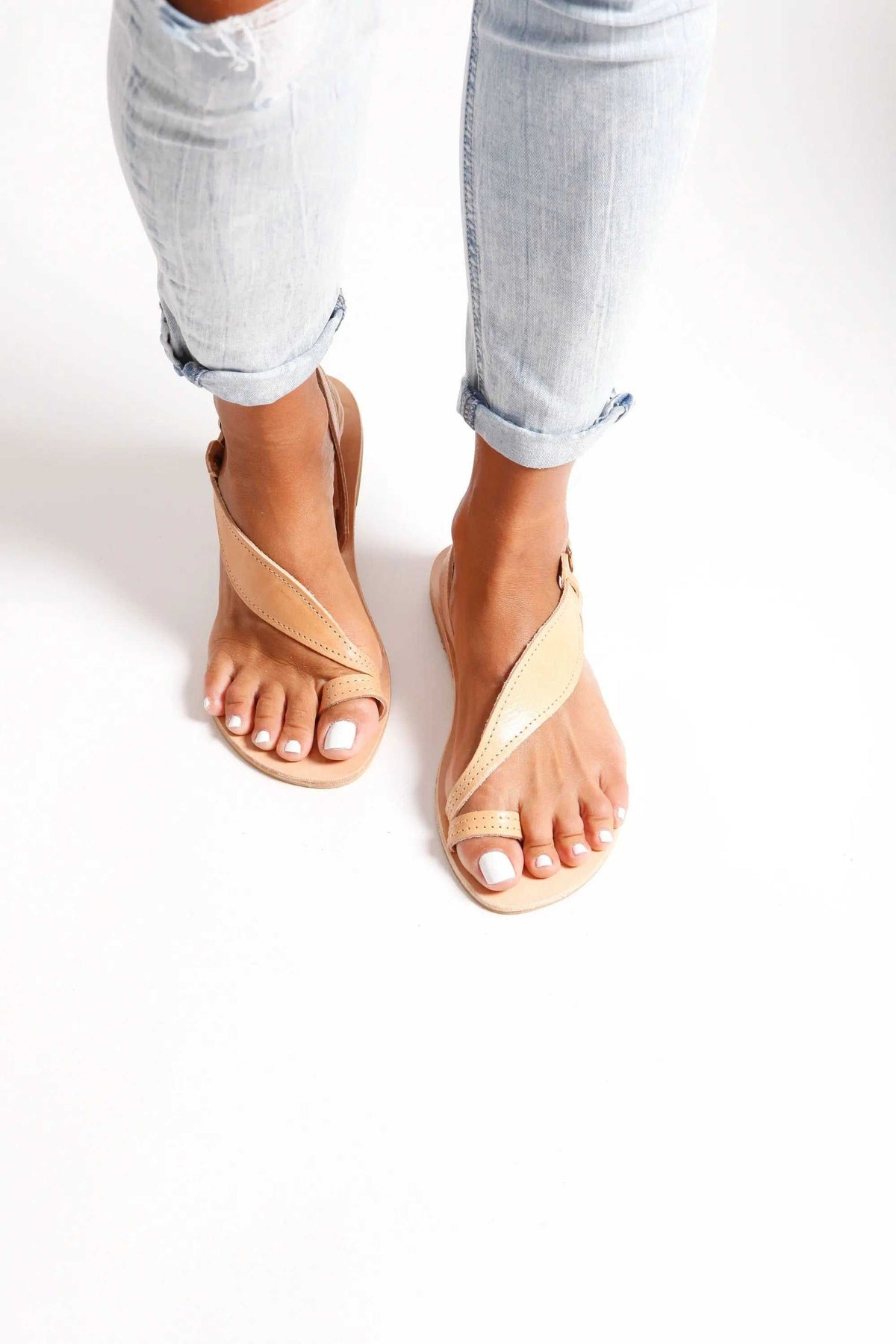 FILO Handmade Greek Sandals in natural tan leather with slim crossed straps, toe loops and delicate ankle straps