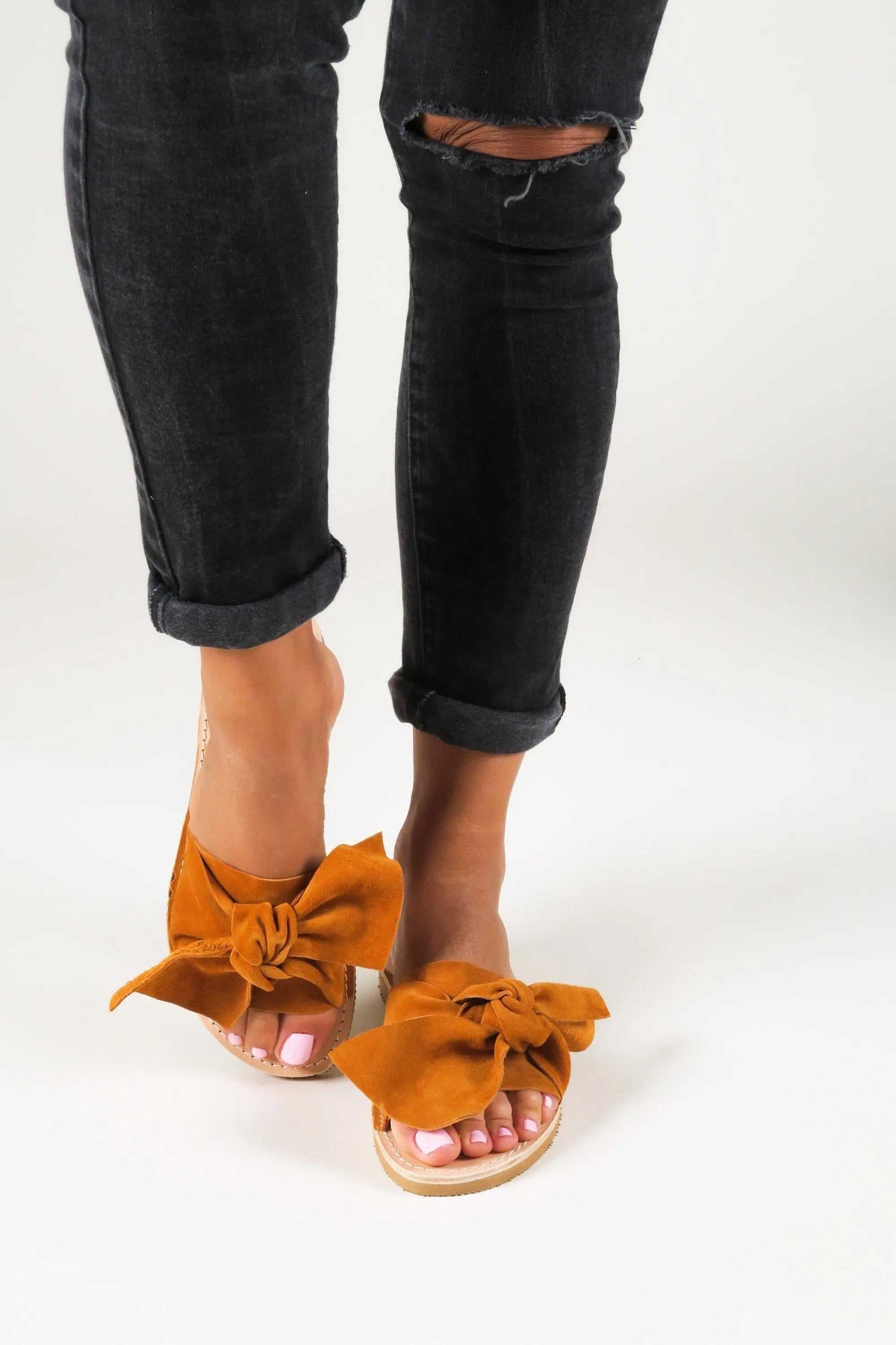 FIOGOS Handmade Greek Sandals in paprika orange suede leather with oversized tied bows and natural leather soles