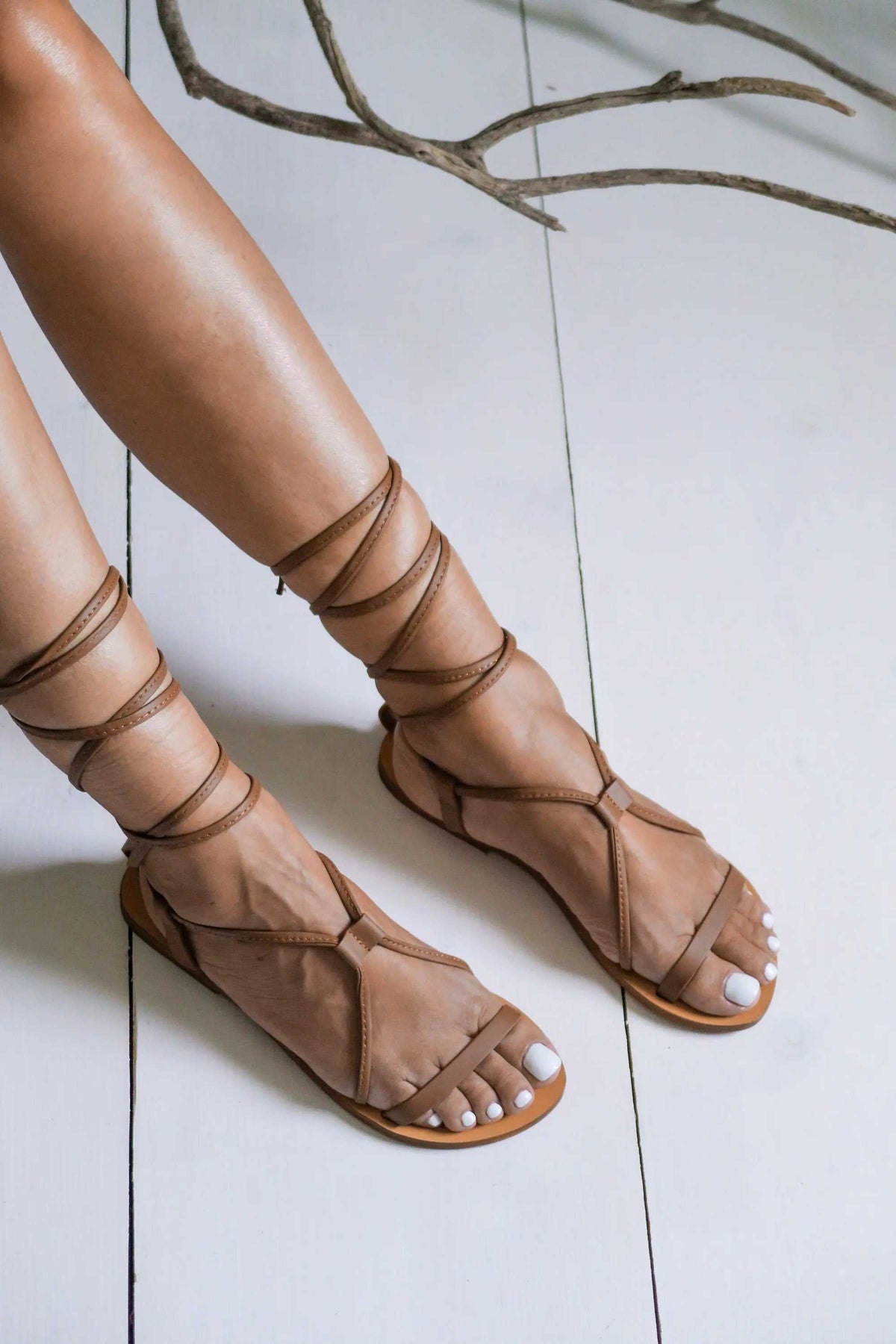 FISKARDO Handmade Greek Sandals in tobacco-brown leather with gladiator straps winding up the ankles and a flat sole
