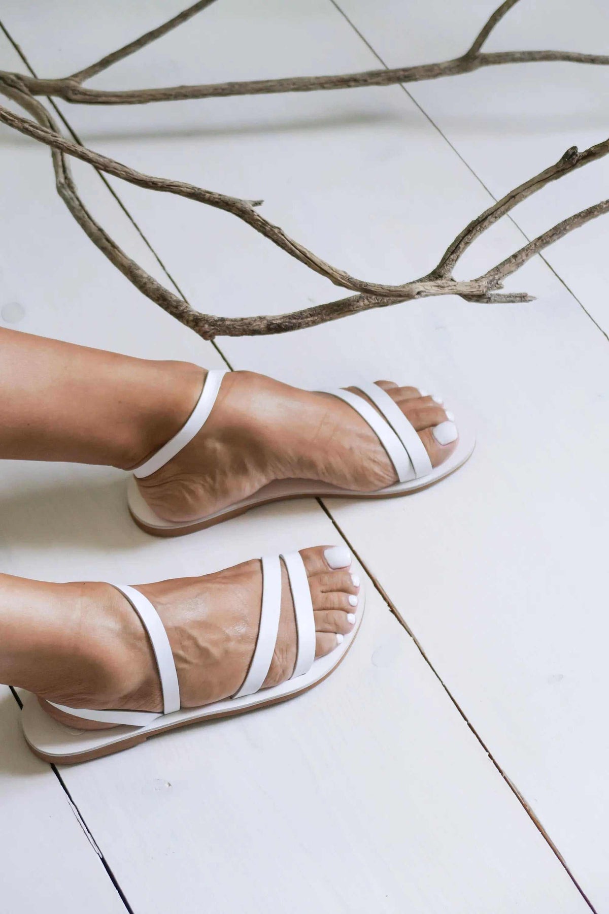 FOLEGANDROS Handmade Greek Sandals with white leather straps, natural leather insoles and flat rubber soles