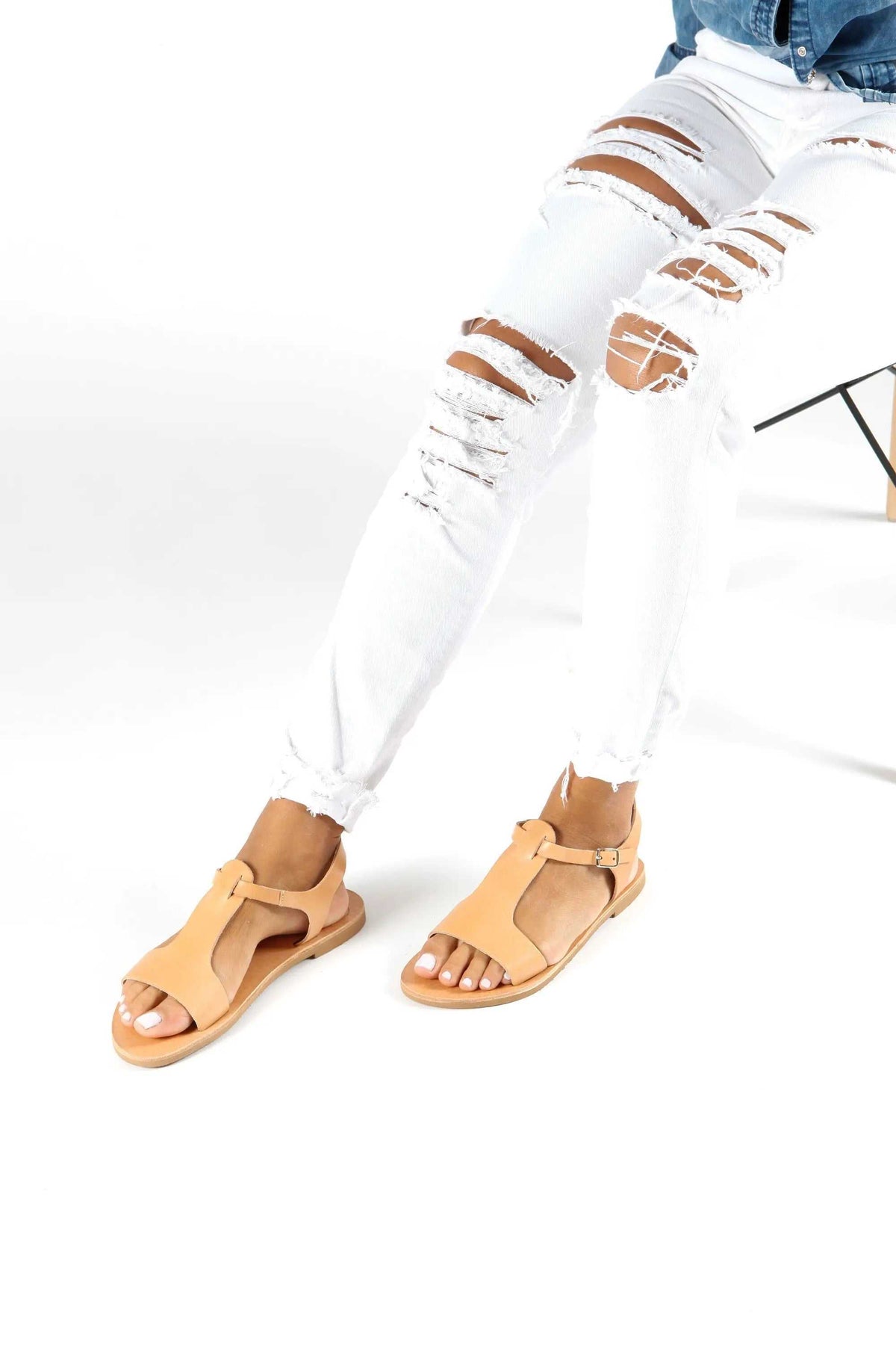 IFIGENE Handmade Greek Sandals in tan leather with strappy cutout design and adjustable ankle buckles