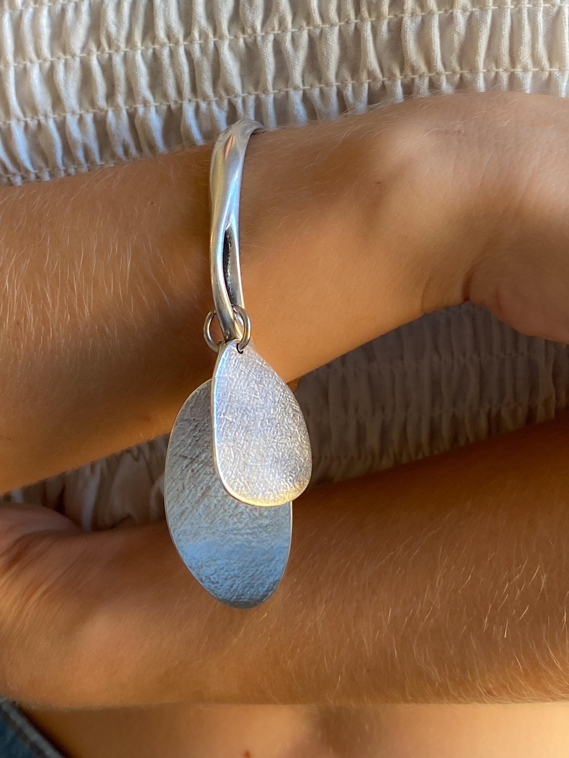 Chunky Silver charm bracelet with hanging discs, Statement Thick bangle bracelet, Oversized Bracelet Glam Rock style, AKAN
