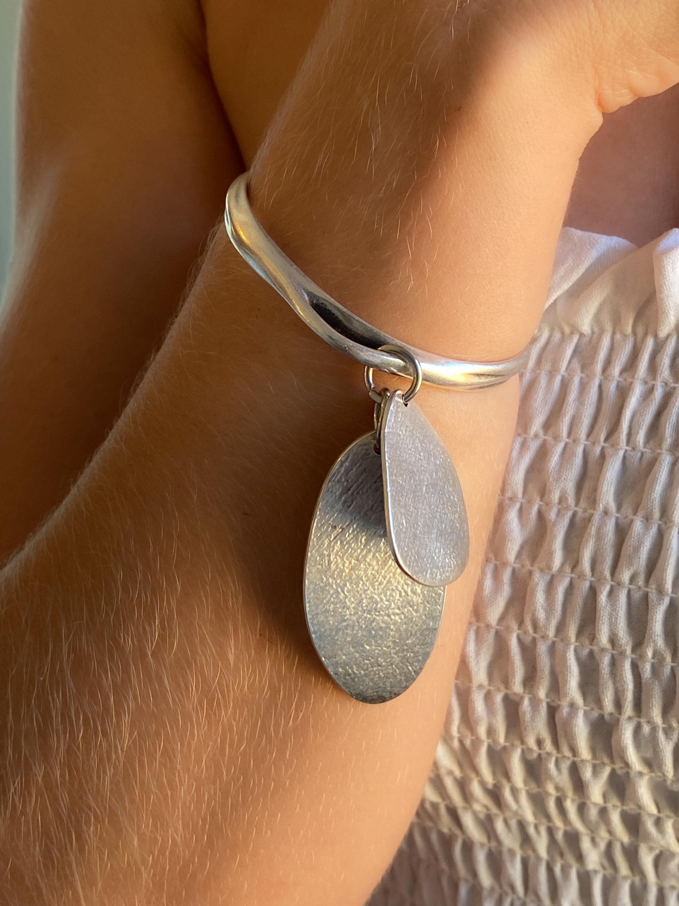 Chunky Silver charm bracelet with hanging discs, Statement Thick bangle bracelet, Oversized Bracelet Glam Rock style, AKAN