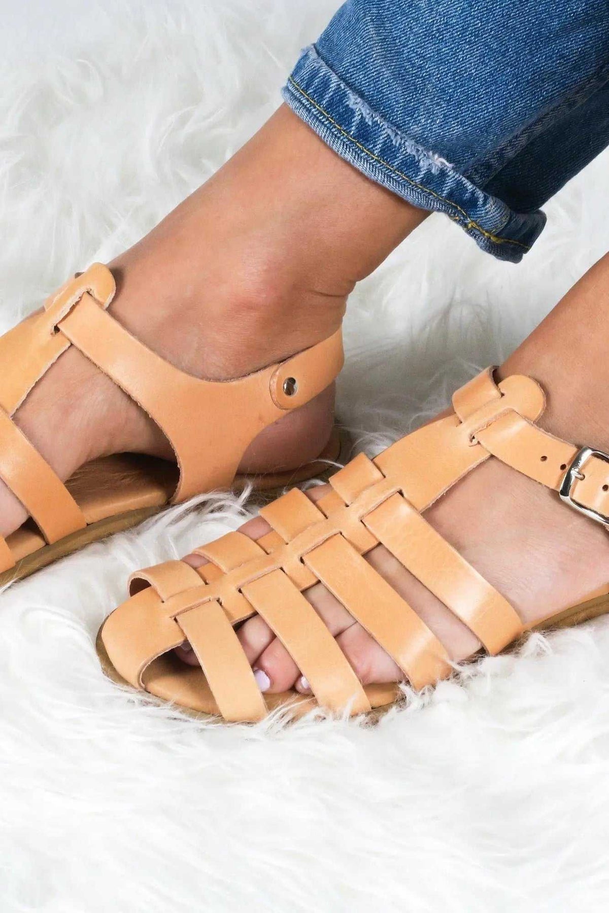 KIMOLOS Handmade Greek Sandals in tan leather with woven gladiator straps, buckled ankle straps and flat soles
