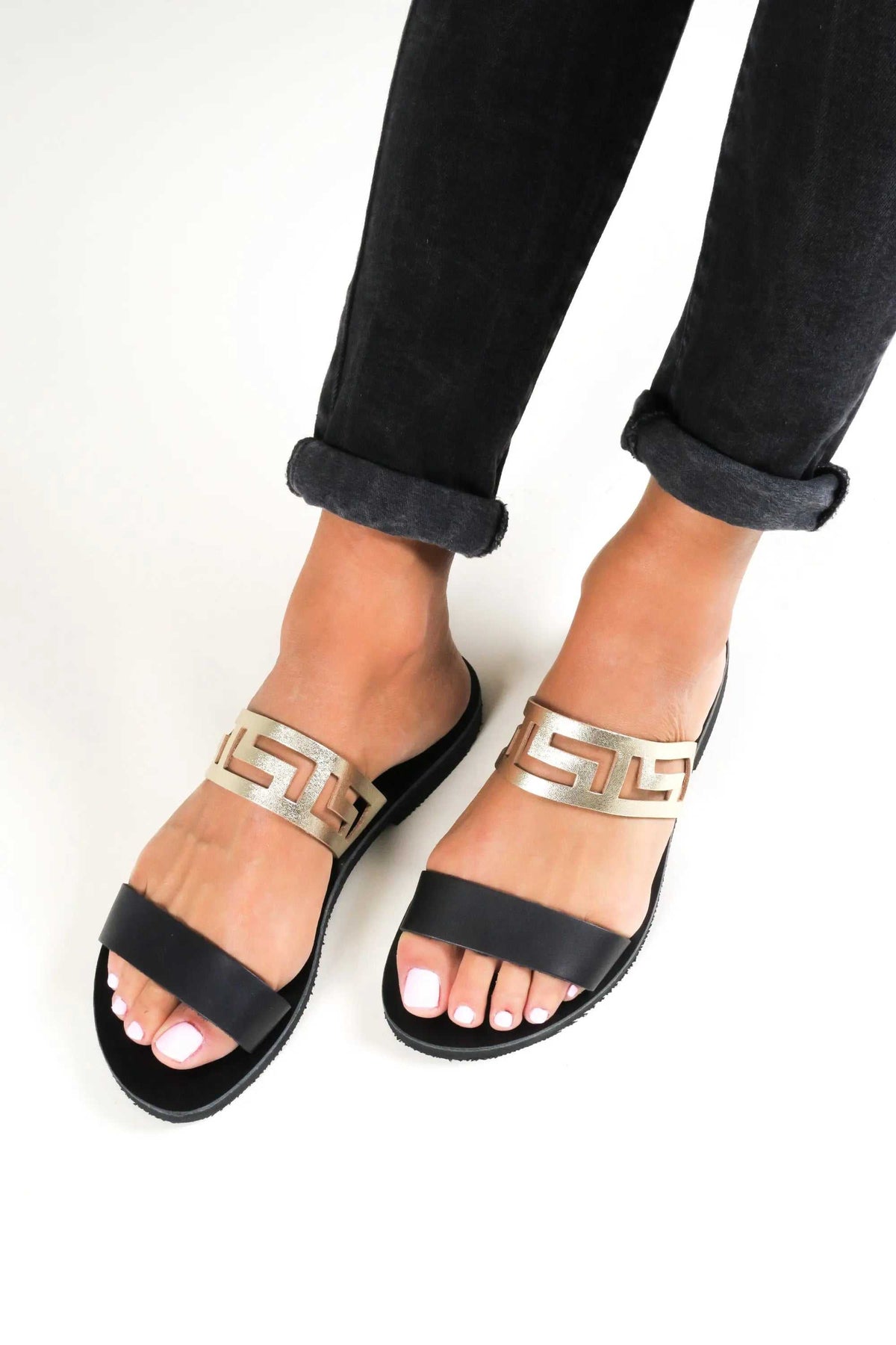 KNOSSOS Handmade Greek Sandals in black leather with metallic gold Meander-pattern straps and open toes
