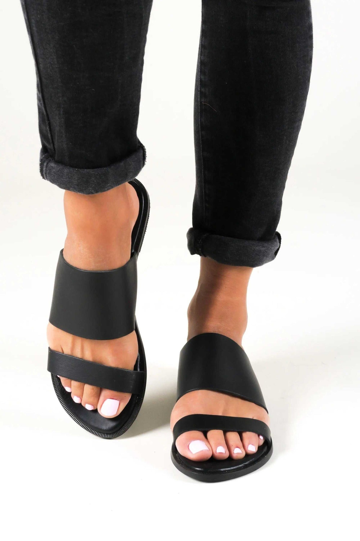 KYTHIRA Handmade Greek Sandals in black leather with wide upper straps, open toes and a flat sole