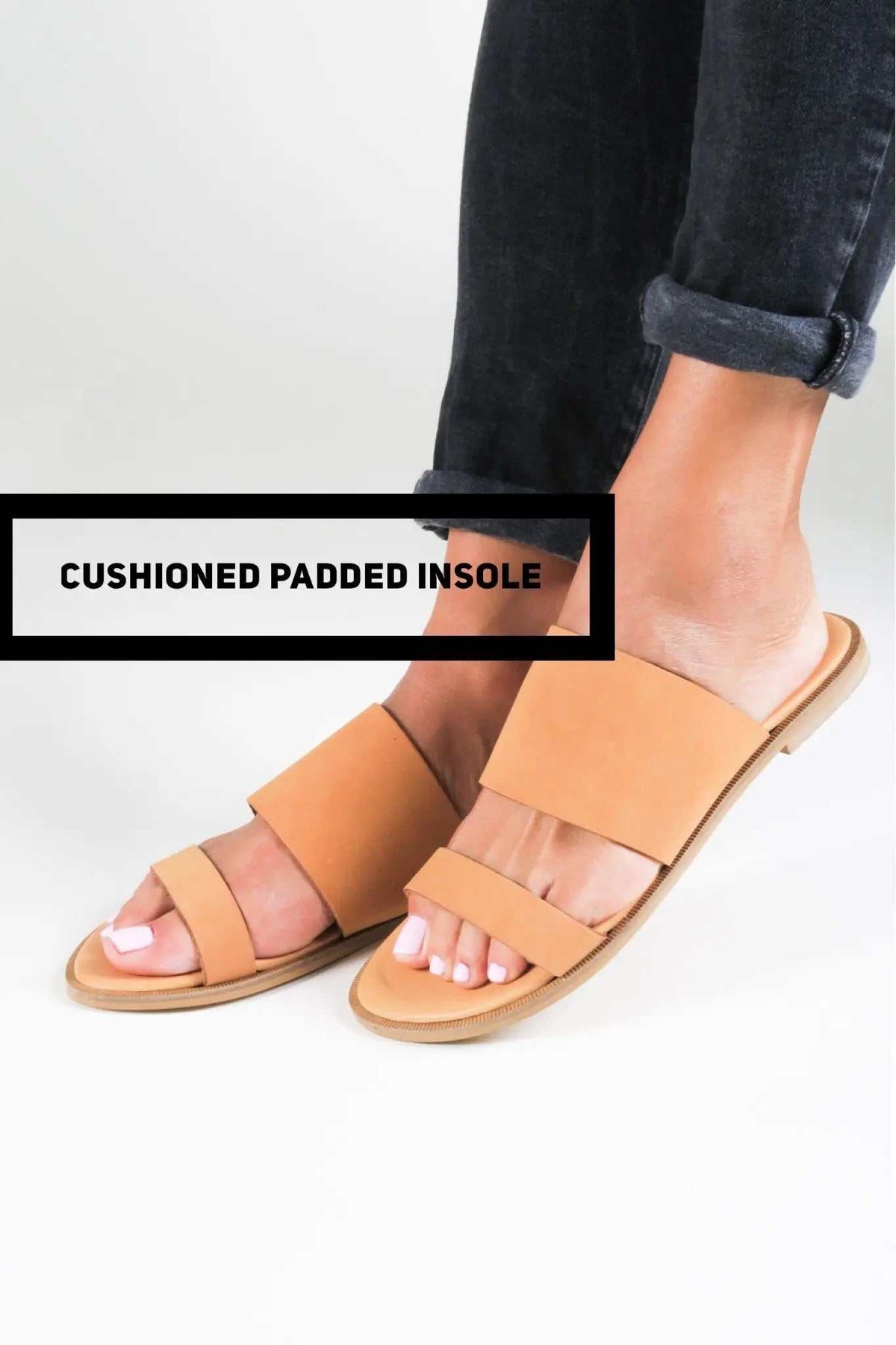 KYTHIRA Handmade Greek Sandals in tan leather with two wide straps, open toes, and a padded cushioned insole.