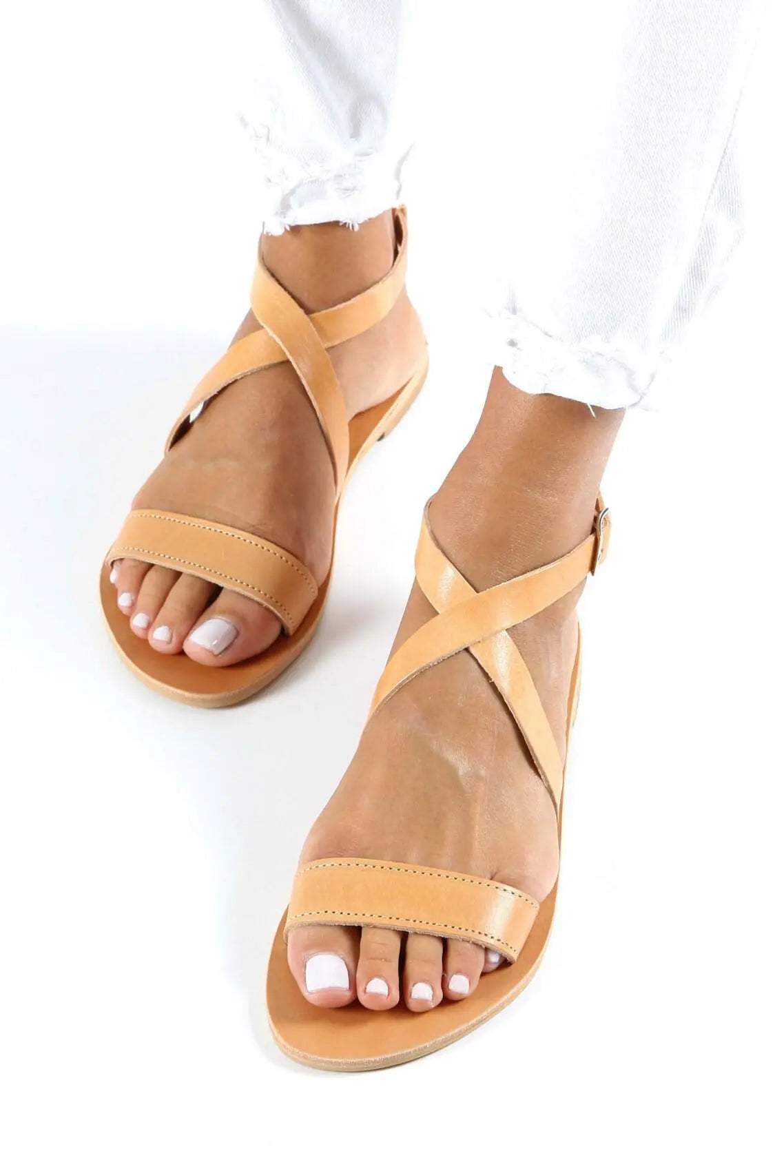 MYRTO Handmade Greek Sandals in natural tan leather with open toes and elegant criss-cross straps
