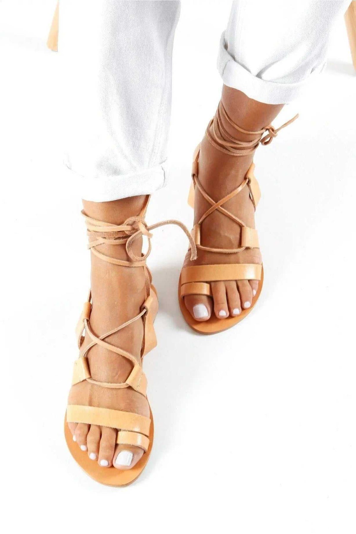 NEFELI Handmade Greek Sandals in tan leather with gladiator straps, lace-up ties, and open toes