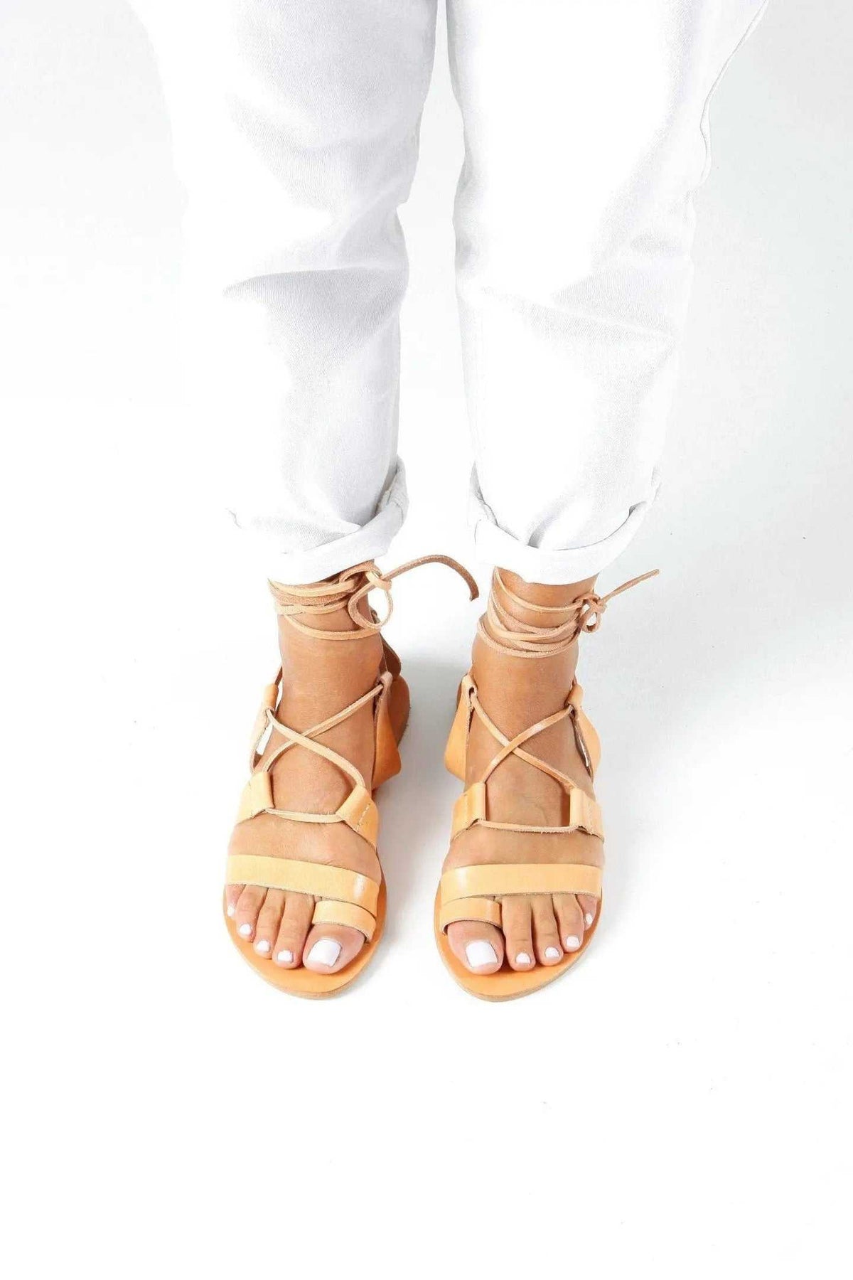 NEFELI Handmade Greek Sandals in natural tan leather with gladiator straps, ankle ties, and open toes