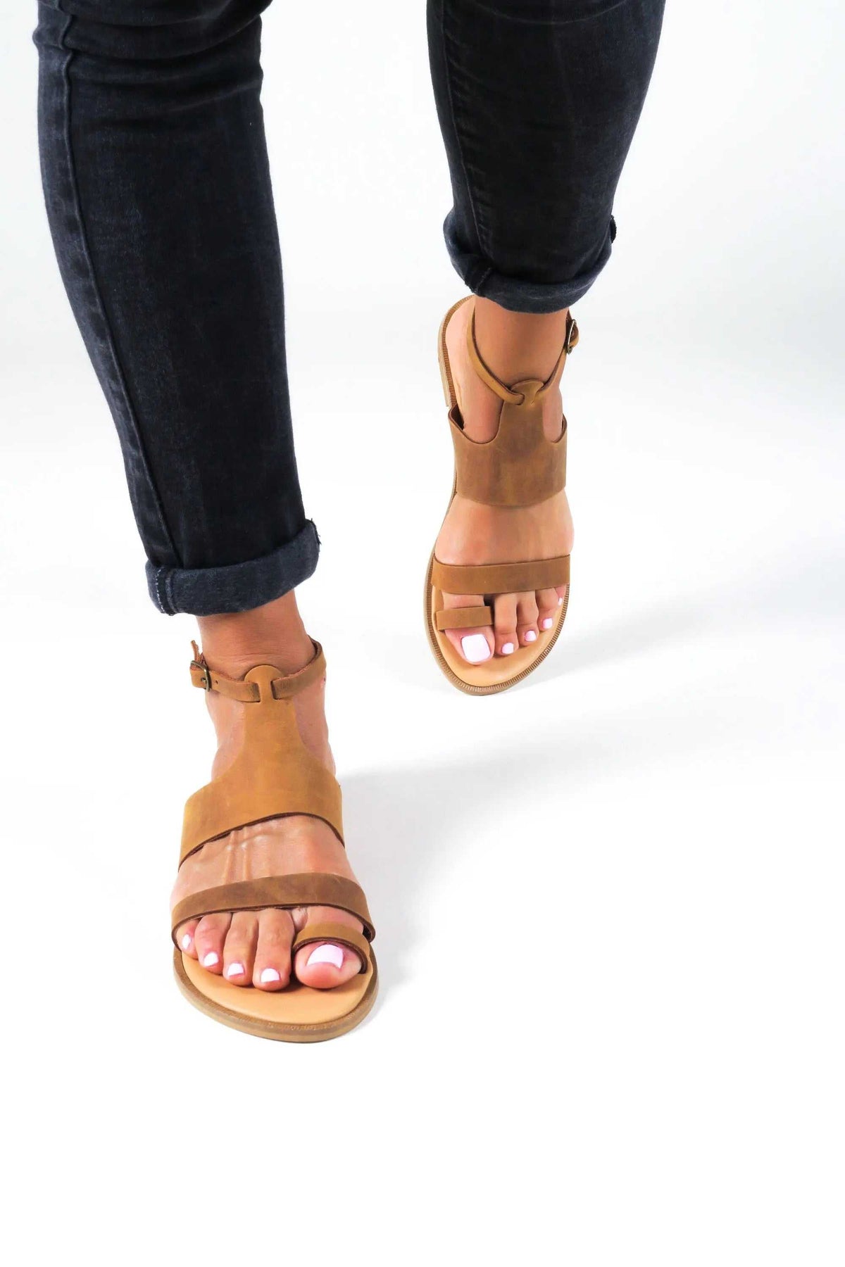 NIKEA Handmade Greek Sandals in tan leather with ankle straps, wide bands, and open toes