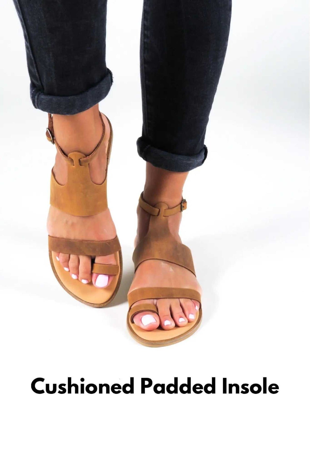 NIKEA Handmade Greek Sandals in tan leather, with open toes, broad front straps, ankle buckles and padded insoles.