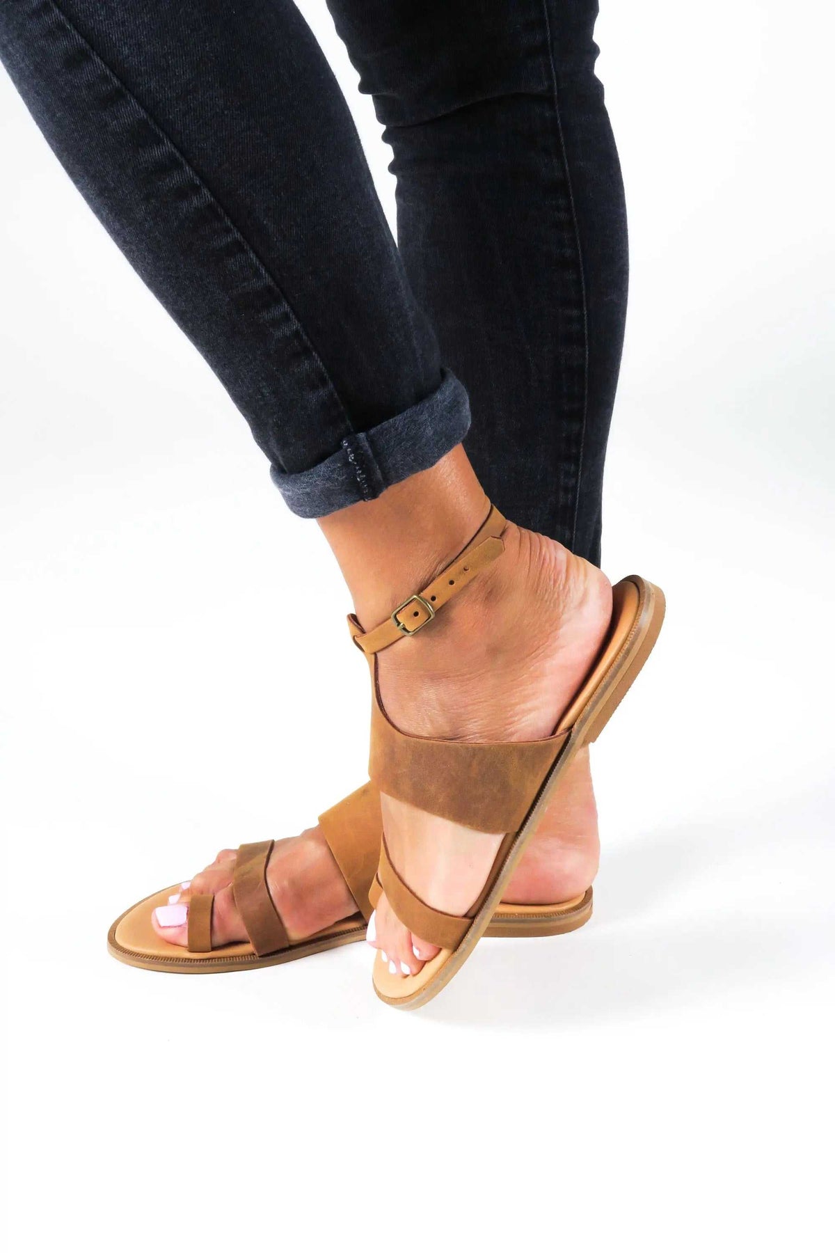 NIKEA Handmade Greek Sandals in tan leather with buckle ankle strap, wide bands and layered flat sole