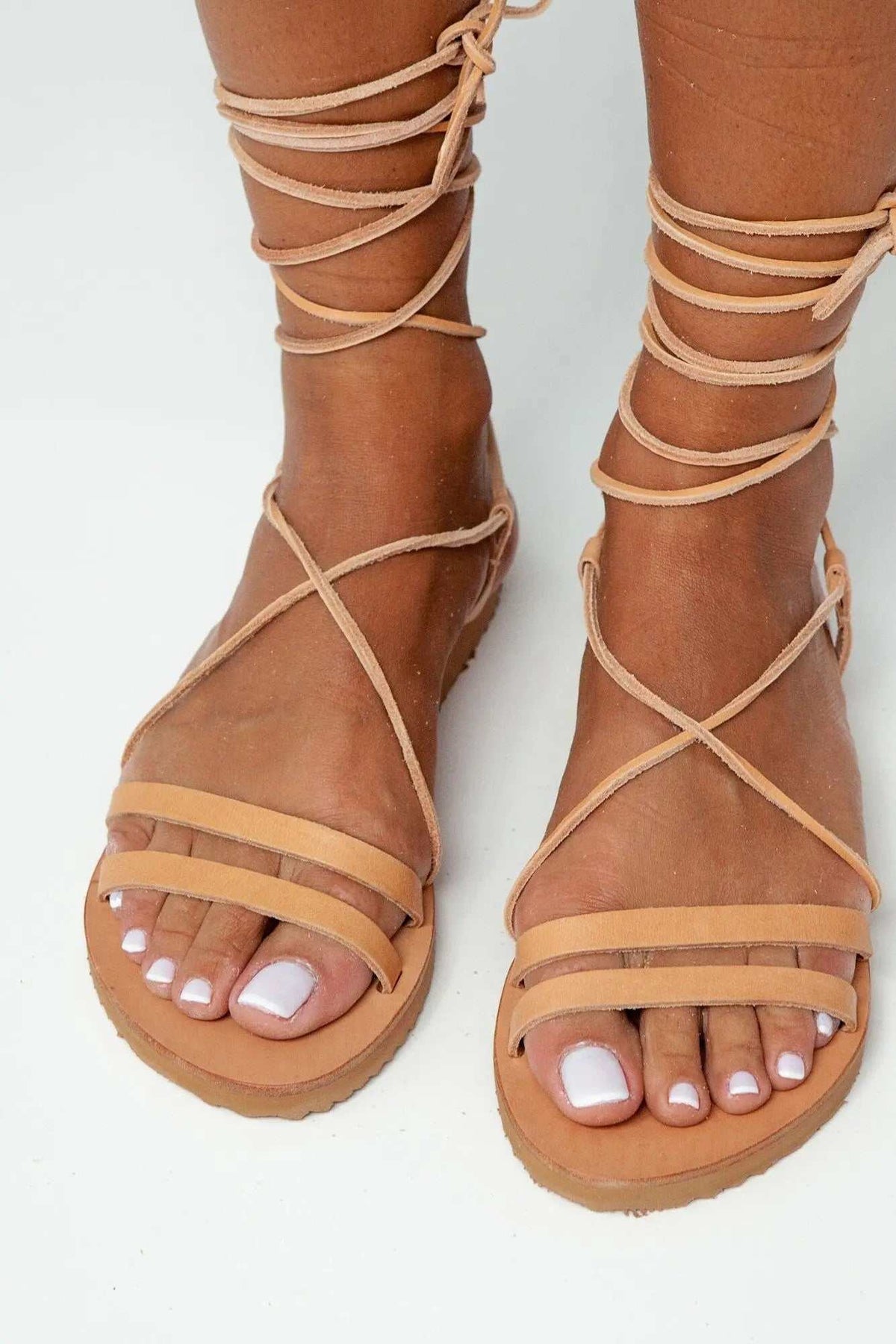 PAXOS Handmade Greek Sandals in natural brown leather with gladiator straps and flat rubber soles