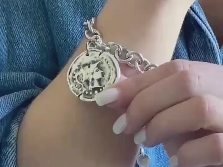 Chunky silver charm bracelet with coins