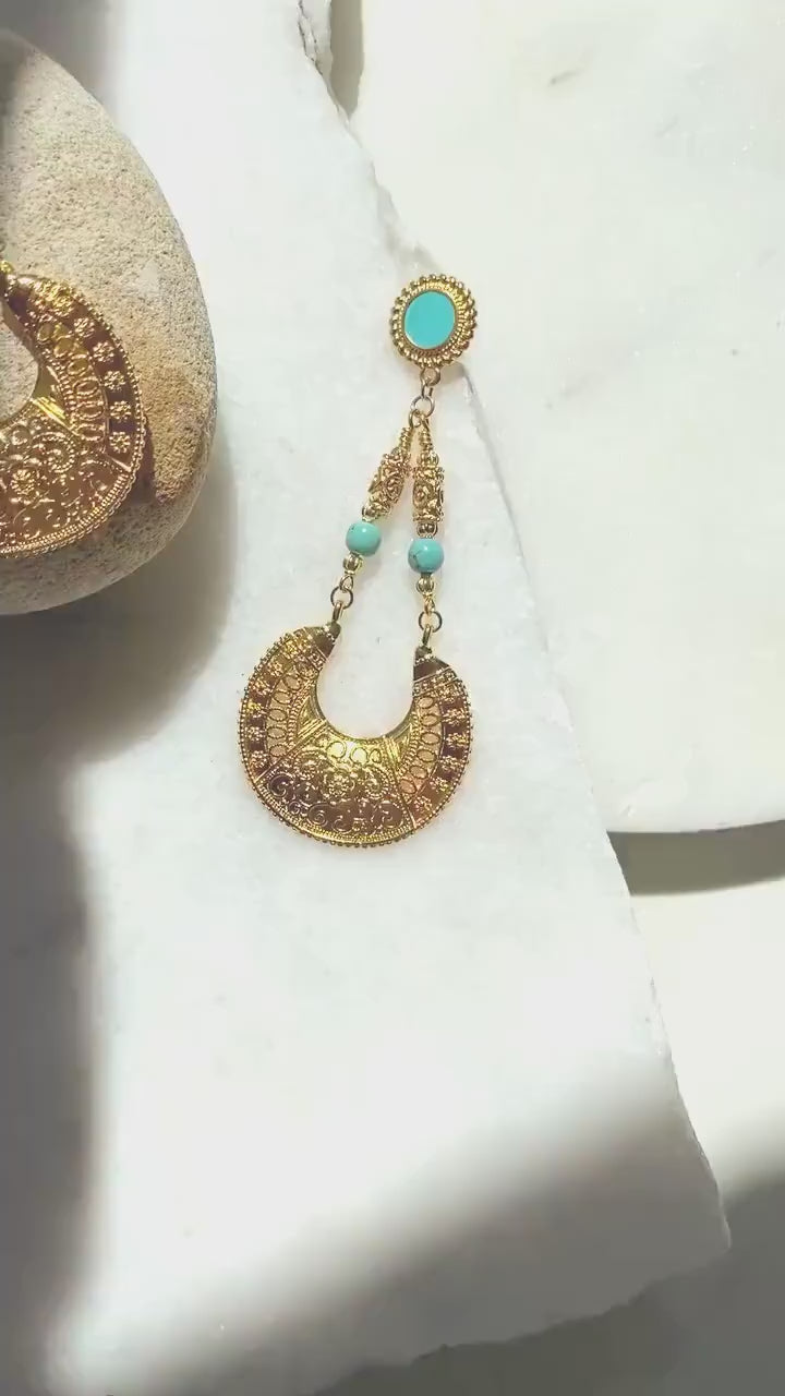 Big gold earrings