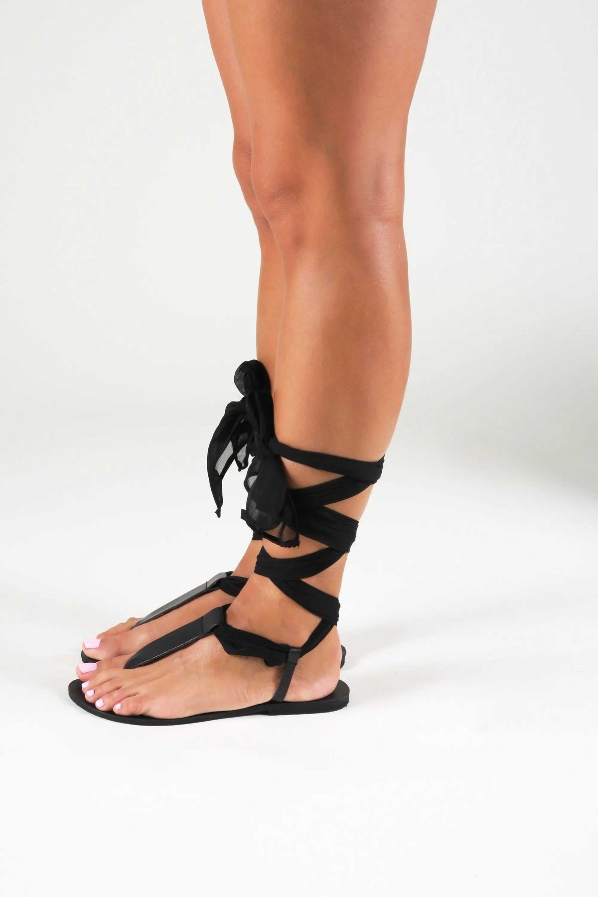 ROMEIKOS Handmade Greek Sandals in black leather with gladiator straps and wraparound scarf laces