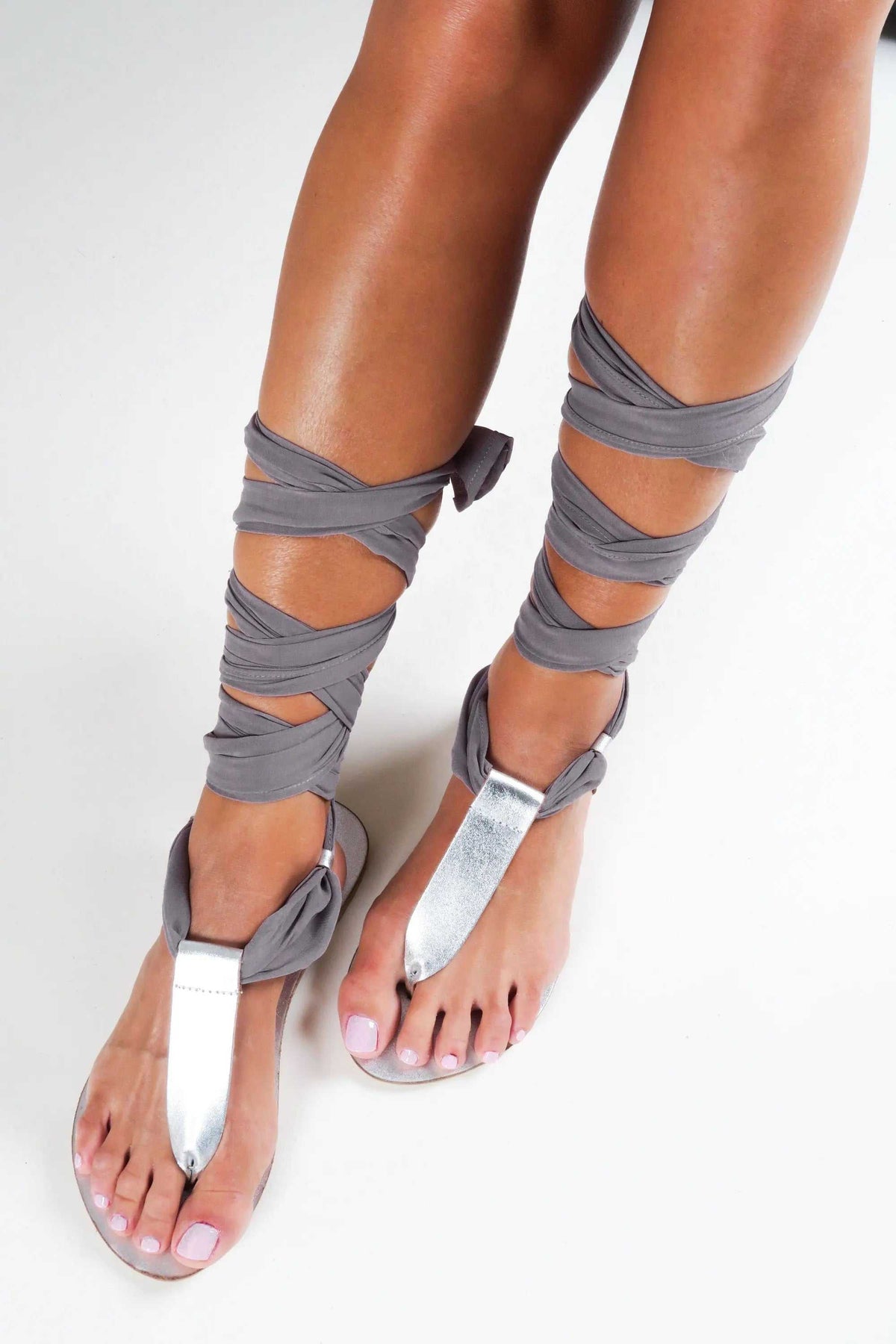 ROMEIKOS Handmade Greek Sandals in silver leather with grey scarf laces and gladiator-style ankle straps