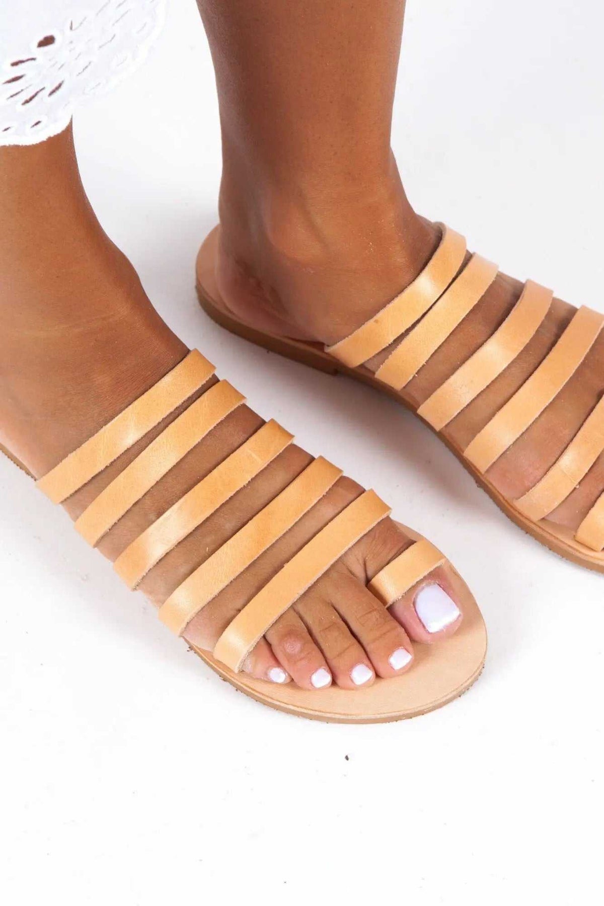 SANTORINI Handmade Greek Sandals in natural tan leather with multiple slim straps and a flat sole