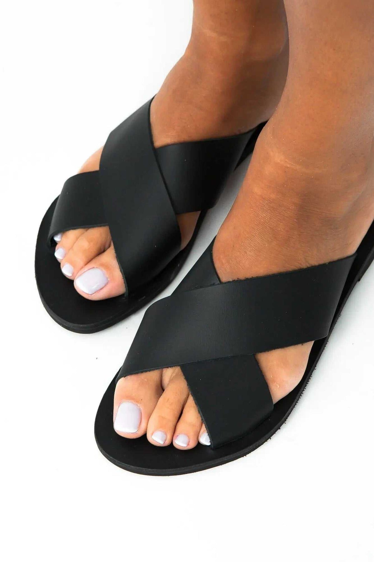 SIFNOS Handmade Greek Sandals in black leather with wide X-cross straps and flat anti-slip soles