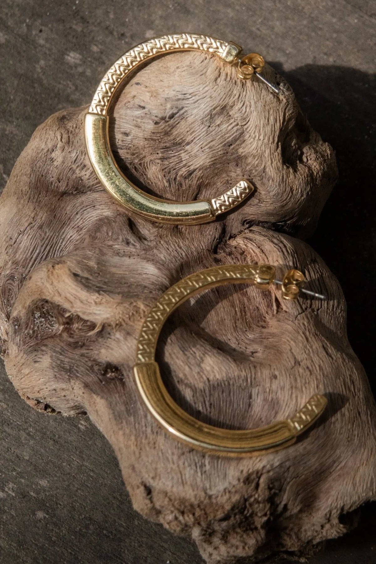 24 k gold filled hoops in gold-tone metal with engraved geometric tribal patterns and curved open hoops