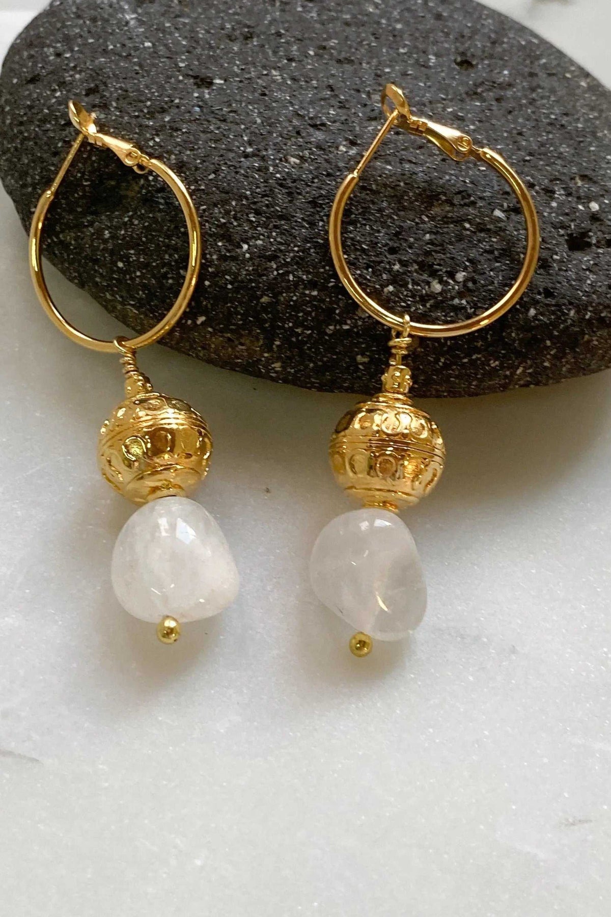 AGAPE EARRINGS, gold-tone hoop earrings with ornate bead pendants and white translucent quartz stones