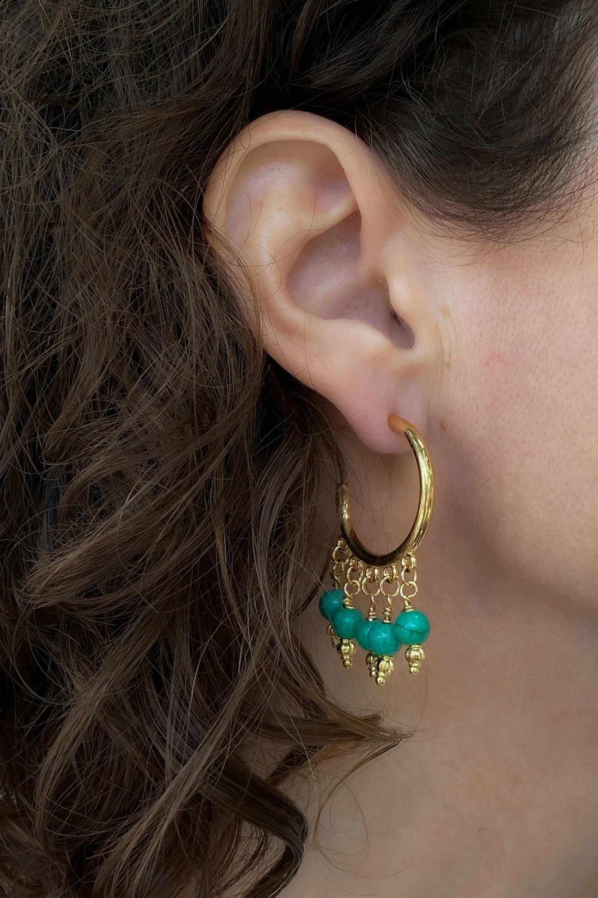 ALEX EARRINGS are gold-tone hoop earrings with turquoise beads and dangling gold chain details