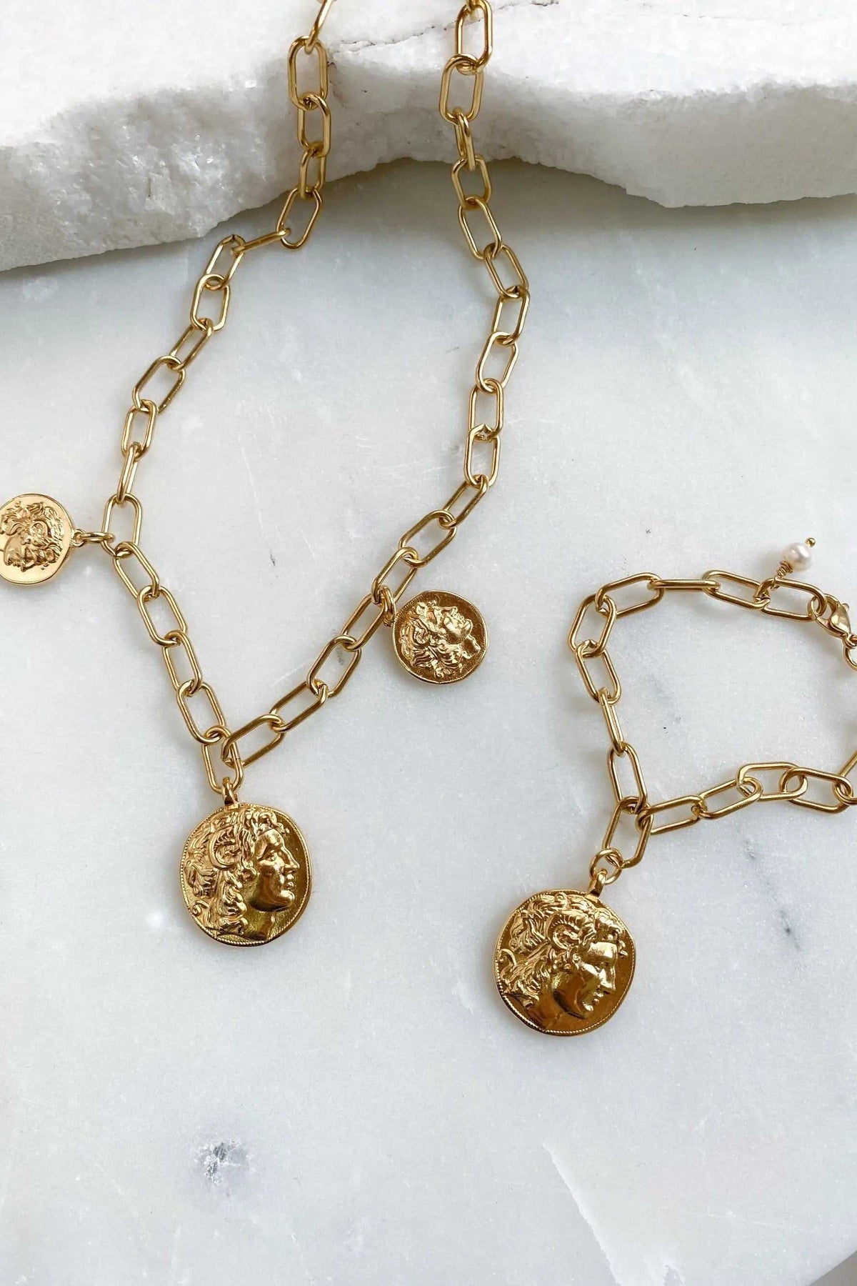 Alexander Charm Bracelet in gold-tone steel with chunky paperclip chain and round ancient Greek coin charms