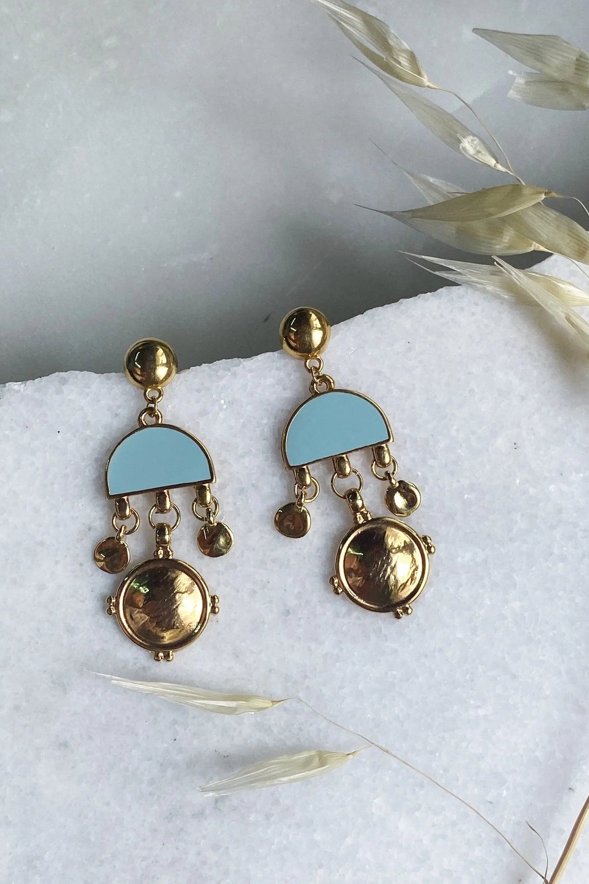 ASTRADENI EARRINGS in gold-tone metal with pale blue semicircles and dangling round charms, including embossed discs