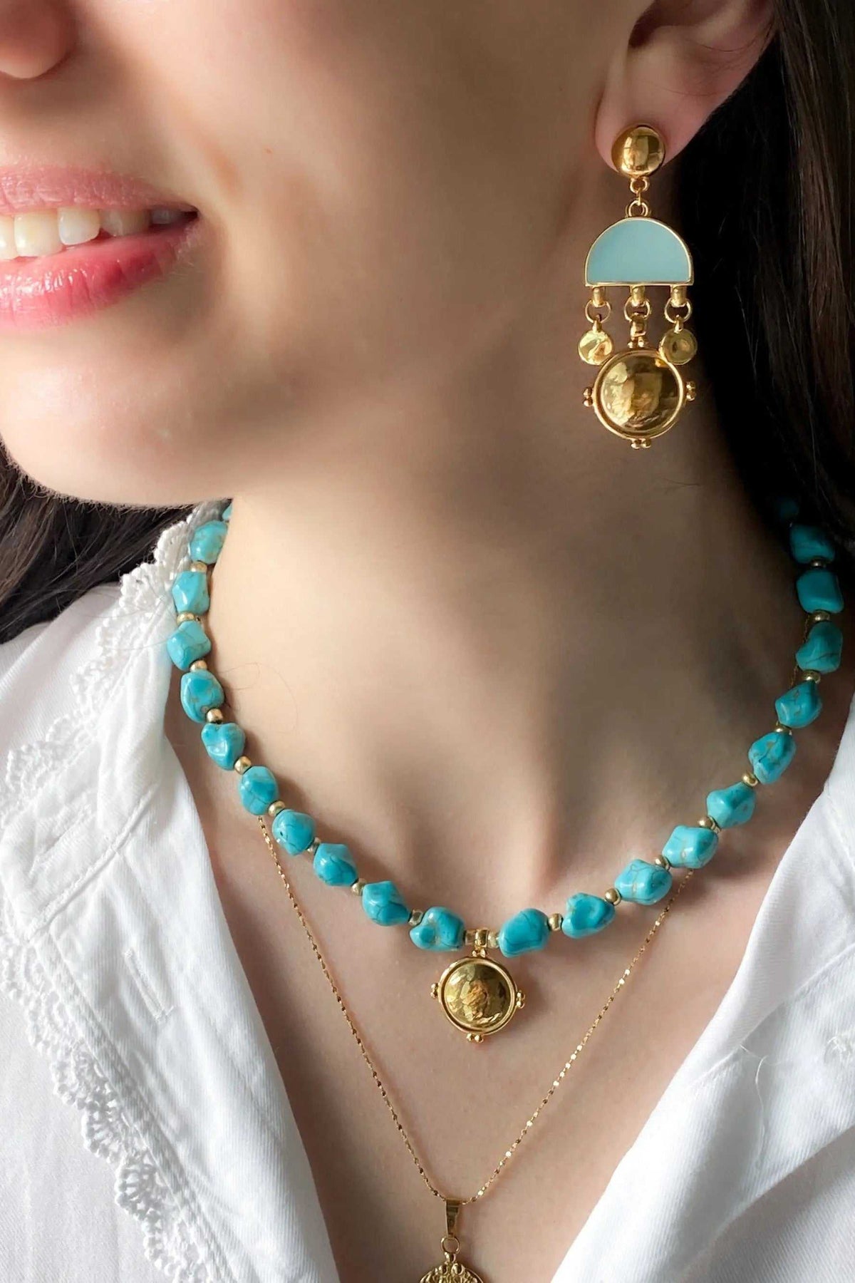 ASTRADENI EARRINGS, gold-tone drop earrings with a turquoise semicircle, dangling charms and coin pendant