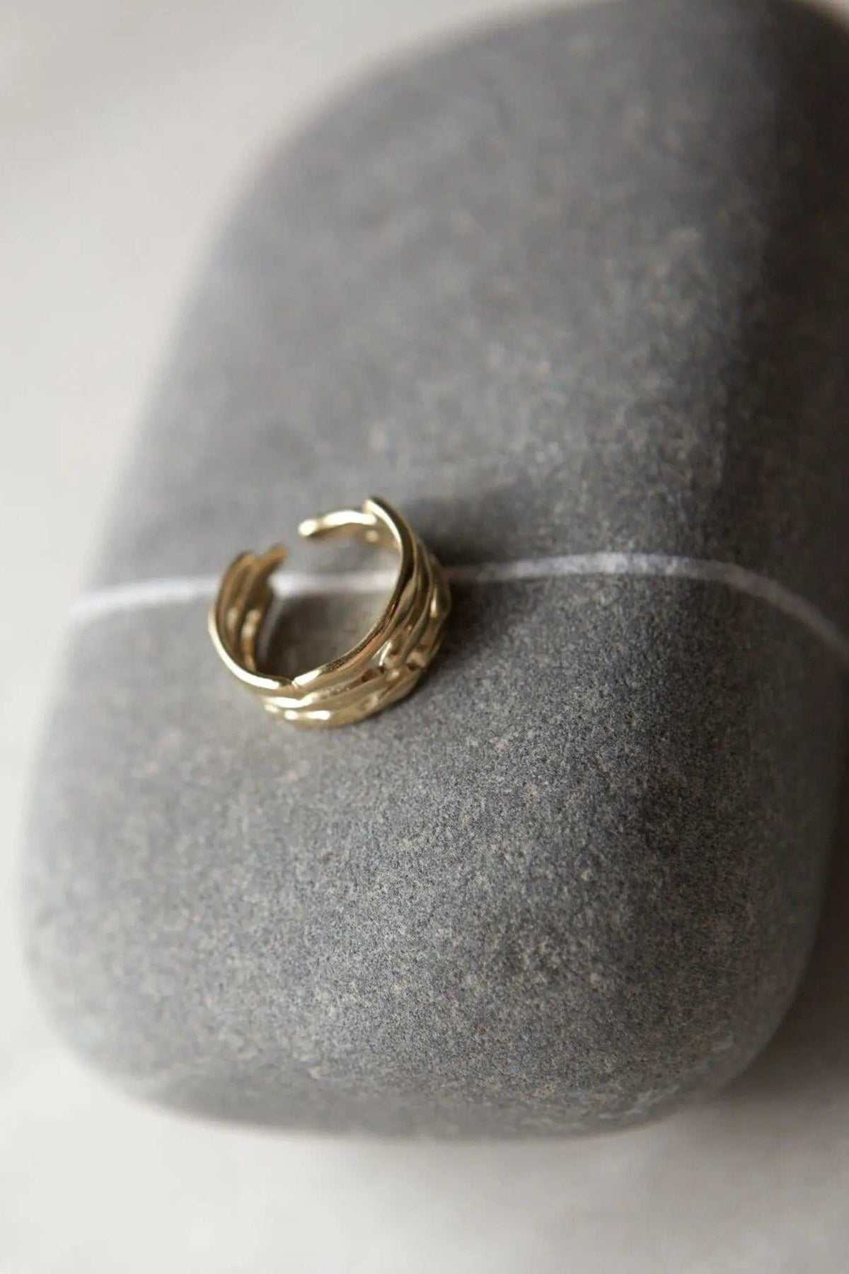Bamboo pattern RING in gold-tone metal, featuring a textured bamboo-like design and an adjustable open band