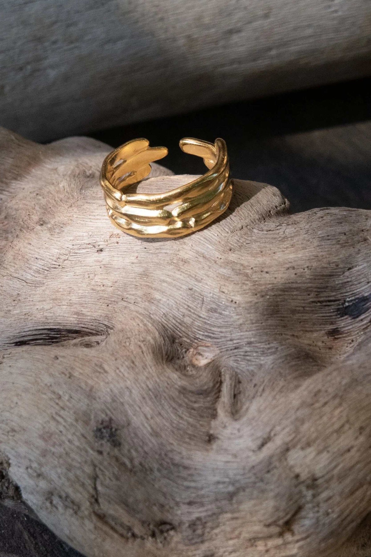 Bamboo pattern RING in gold-tone polished metal, featuring a textured bamboo-like band and adjustable open ends
