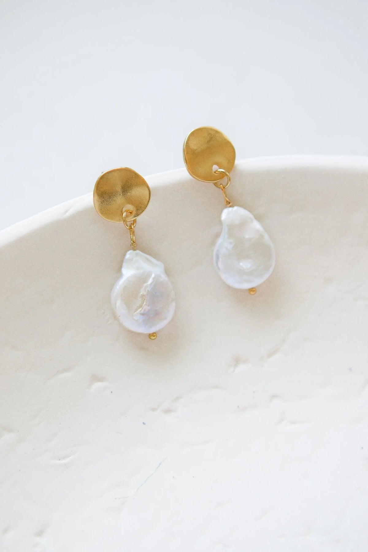 Big tear drop pearl Earrings with lustrous white freshwater pearls, irregular teardrop shapes and round gold-tone studs