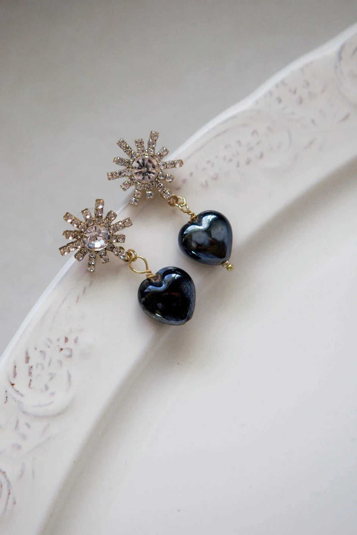 BLACK crystal Heart Earrings with glossy black heart drops, gold-tone links, and sparkling crystal starburst studs