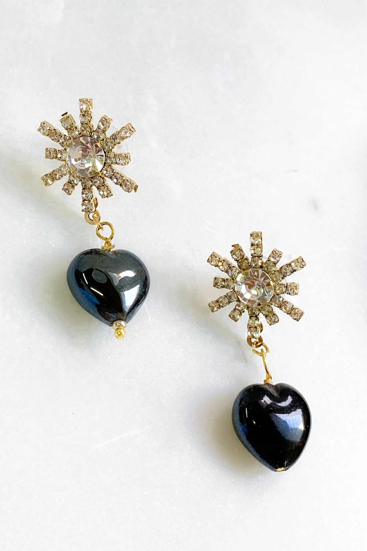 BLACK crystal Heart Earrings with glossy black heart pendants and gold-tone crystal sunburst tops