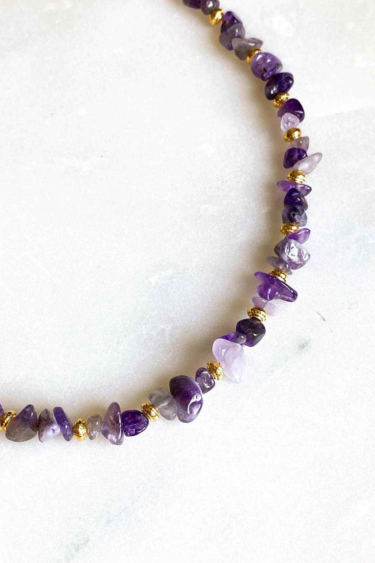 Blue Jade necklace made with irregular purple stone chips and gold-toned spacer beads