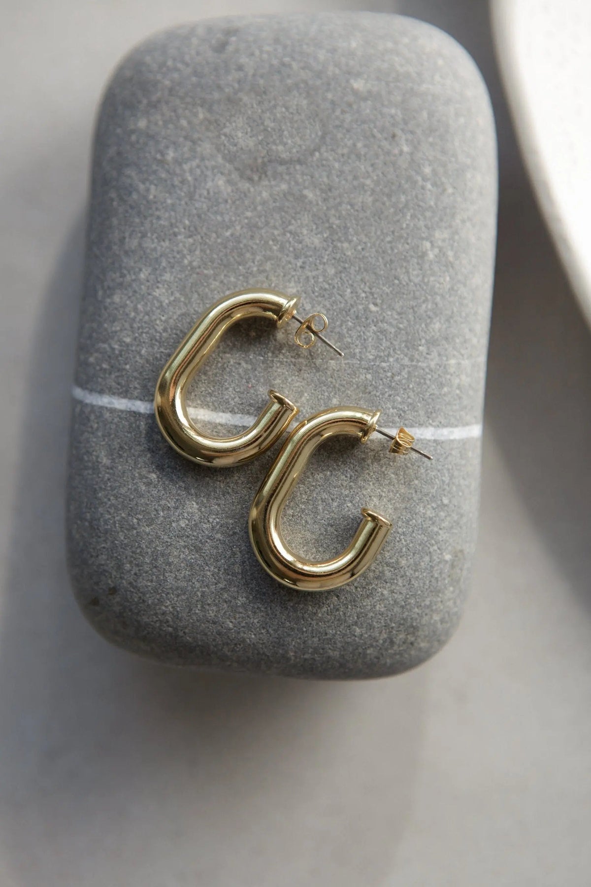 Chunky chain Hoops in gold-tone metal with rounded open-link design and polished finish