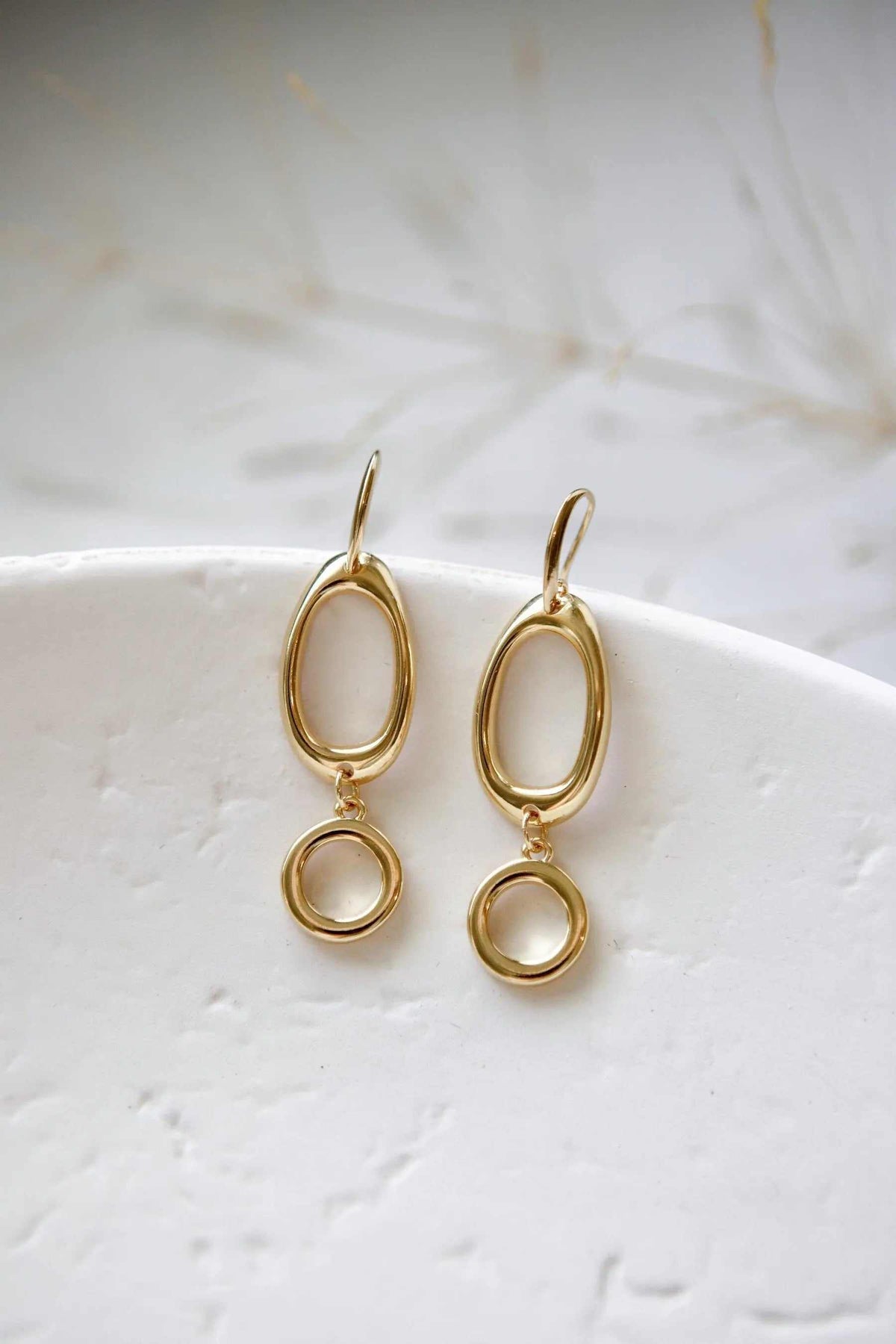 Classic Oval Earrings in gold-tone metal with linked oval and round polished drop designs