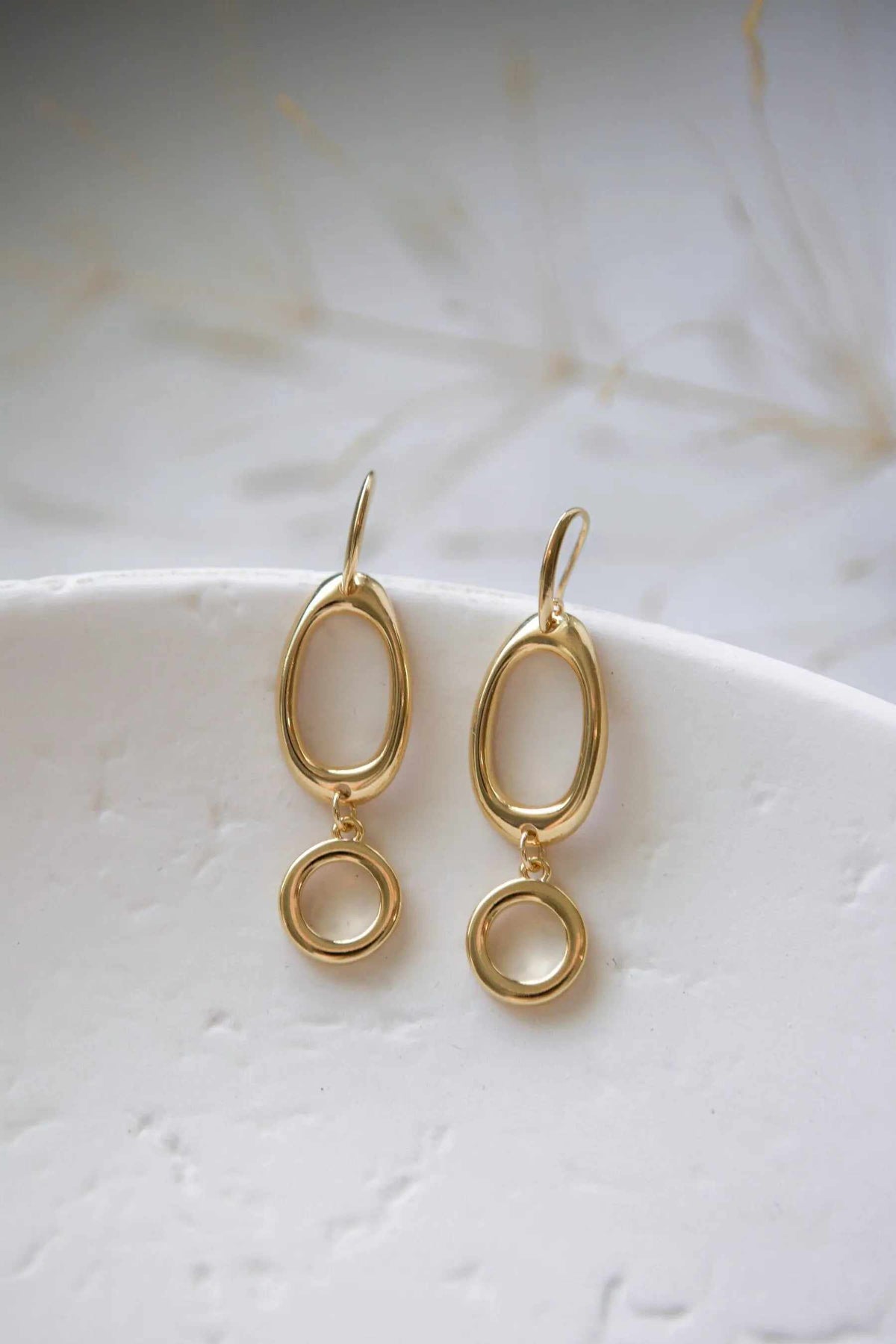 Classic Oval Earrings in polished gold-tone brass with two linked oval hoops and drop details