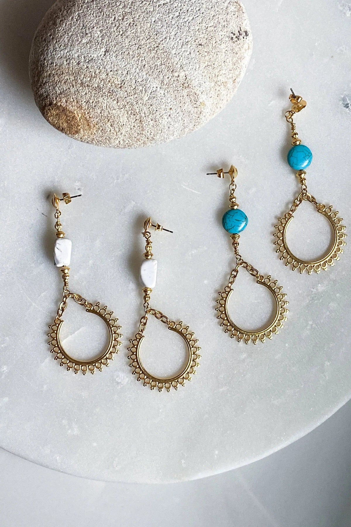 ÉRIS EARRINGS in gold-tone metal with turquoise and white stones, featuring ornate teardrop hoops with beaded edges