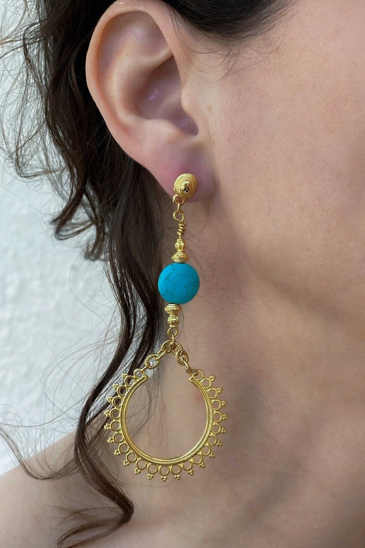 ÉRIS EARRINGS in gold-tone metal with a bright turquoise bead and ornate open circular drop design