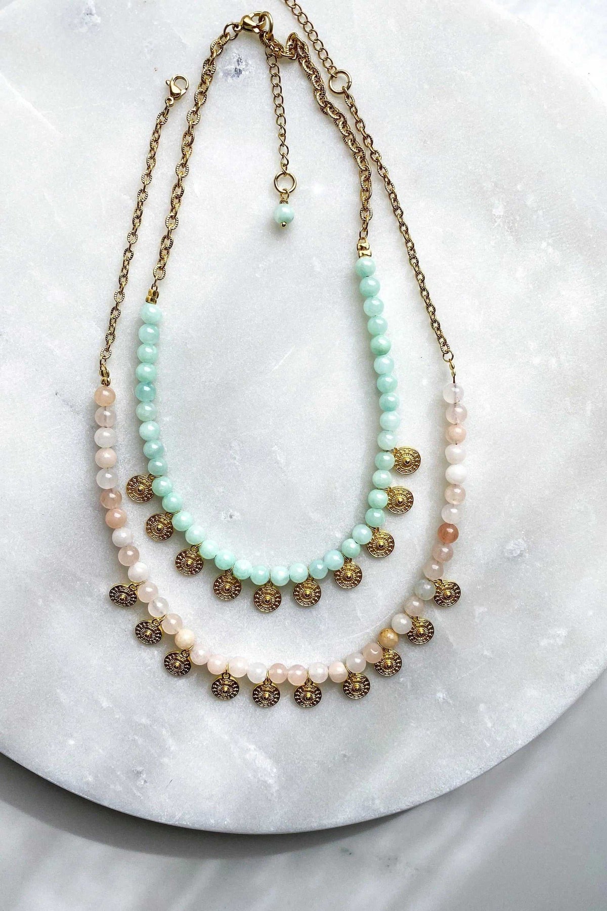 ERSA NECKLACE with layered mint and blush bead strands, antique gold-tone chains, and ornate round gold pendants