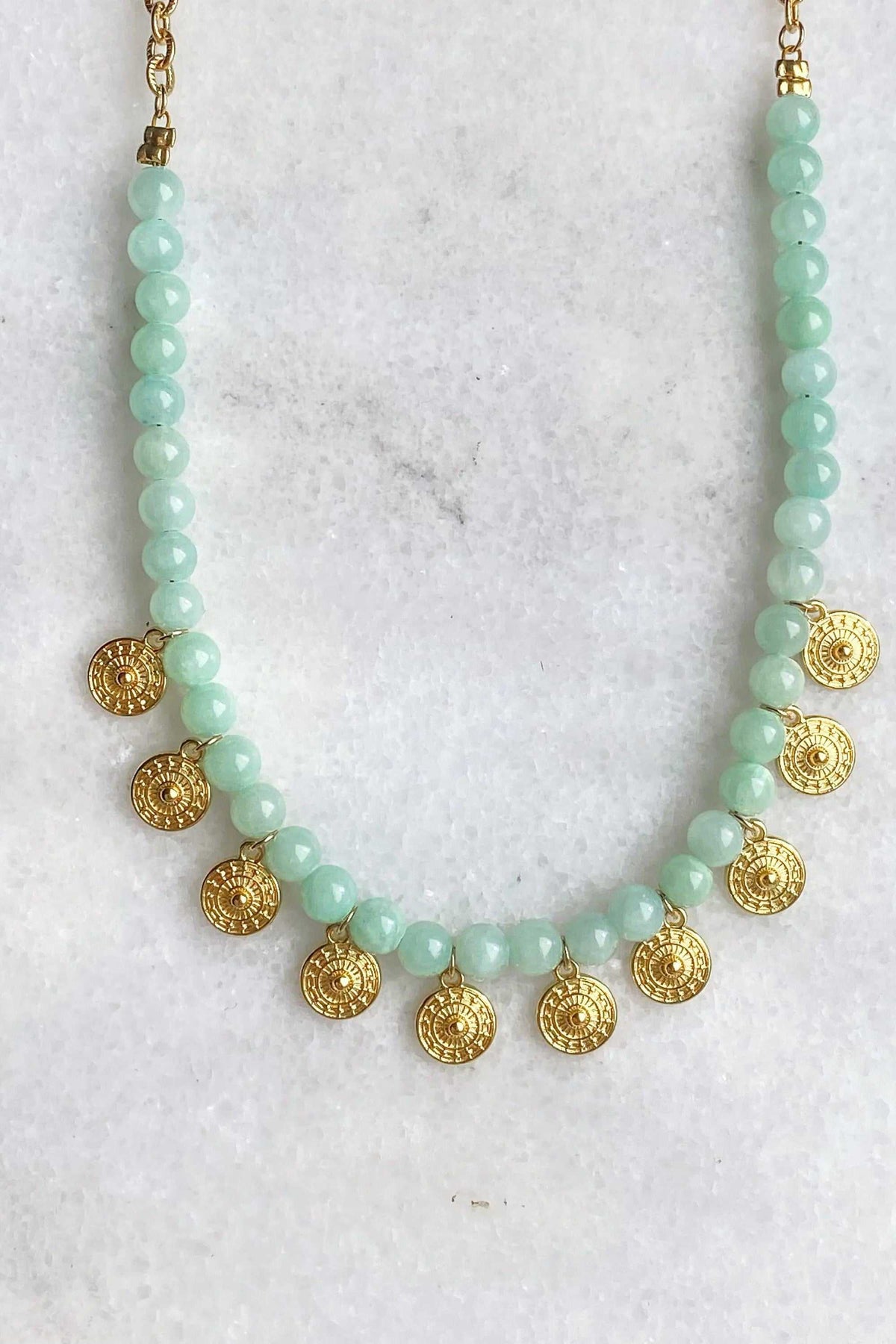 ERSA NECKLACE with pale mint-green round beads, gold-tone chain and ornate circular gold-tone charms