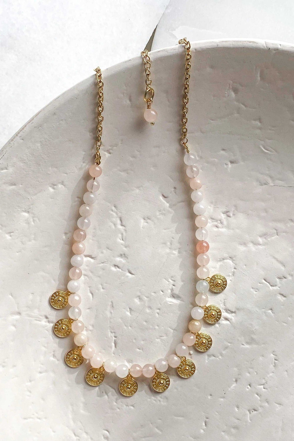 ERSA NECKLACE with pale peach and white round beads, gold-tone chain and small ornate coin pendants